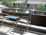 Dining area in a room at a Waikiki Beach resort & hotel.