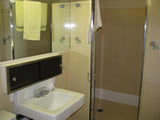 Bathroom in a hotel room at The Breakers Hotel at Waikiki Beach